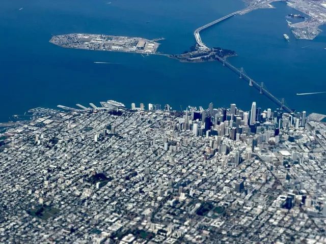 Aerial view of San Francisco, the Bay Bridge and Treasure Island